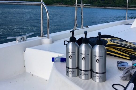 Plaine products, zero waste, plastic free toiletries on the deck of a boat. 